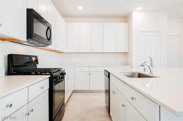 3240 Avernus Ave, Henderson, NV 89044 - kitchen with black appliances, white cabinets, light countertops, and recessed lighting
