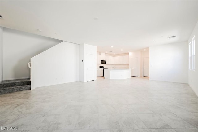 3240 Avernus Ave, Henderson, NV 89044 - unfurnished living room with recessed lighting and stairway
