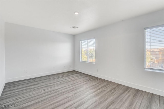 6346 Azurelyn Ave, Las Vegas, NV 89122 - unfurnished room featuring wood finished floors and baseboards