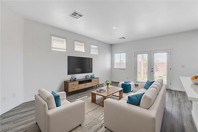 6346 Azurelyn Ave, Las Vegas, NV 89122 - living room with french doors and light wood-style flooring