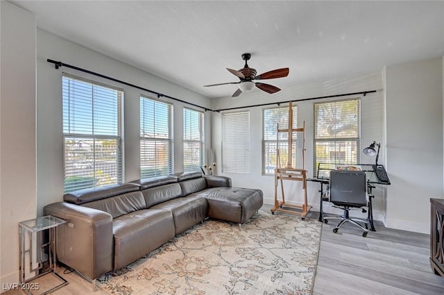 9975 Peace Way Unit 1024, Las Vegas, NV 89147 - living area with ceiling fan, light wood finished floors, and an office area