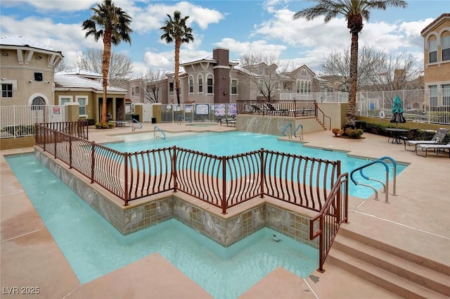 9975 Peace Way Unit 1024, Las Vegas, NV 89147 - community pool with a patio and a residential view