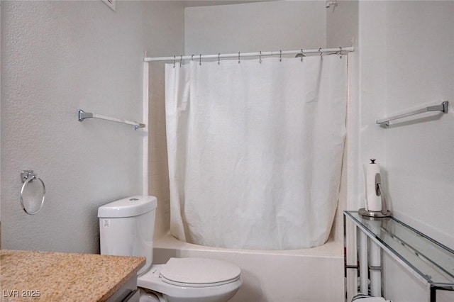 9975 Peace Way Unit 1024, Las Vegas, NV 89147 - bathroom with vanity, shower / bath combination with curtain, and a textured wall