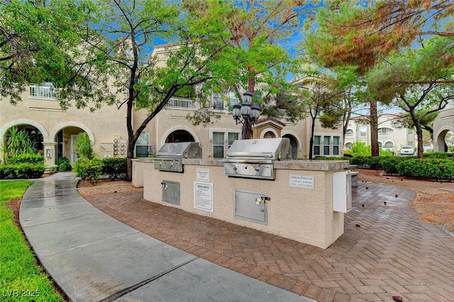9975 Peace Way Unit 1024, Las Vegas, NV 89147 - view of home's community with exterior kitchen