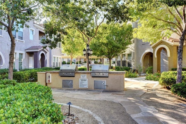 9975 Peace Way Unit 1024, Las Vegas, NV 89147 - view of community featuring area for grilling