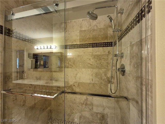 bathroom featuring a shower stall