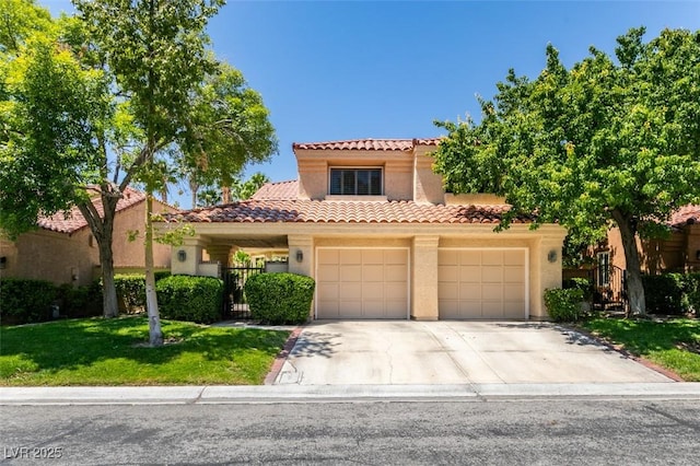 5133 Southern Hills Ln, Las Vegas, NV 89113 - mediterranean / spanish-style house with a tile roof, concrete driveway, stucco siding, and a front yard