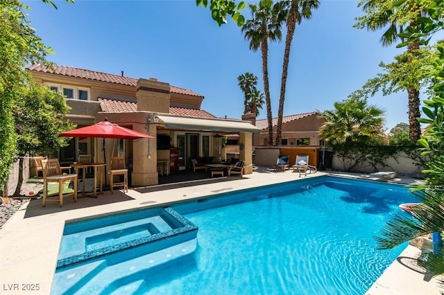 5133 Southern Hills Ln, Las Vegas, NV 89113 - view of swimming pool with a patio, a pool with connected hot tub, and outdoor lounge area