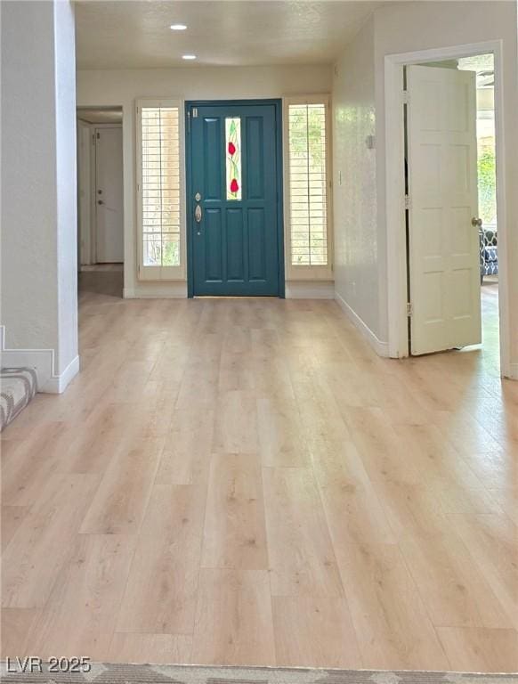 5133 Southern Hills Ln, Las Vegas, NV 89113 - foyer entrance with wood finished floors and recessed lighting