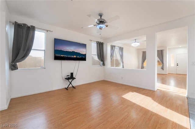 5907 Soft Mist Ct, Las Vegas, NV 89110 - unfurnished living room featuring wood finished floors and ceiling fan