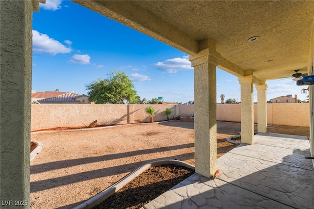 5907 Soft Mist Ct, Las Vegas, NV 89110 - fenced backyard with a patio