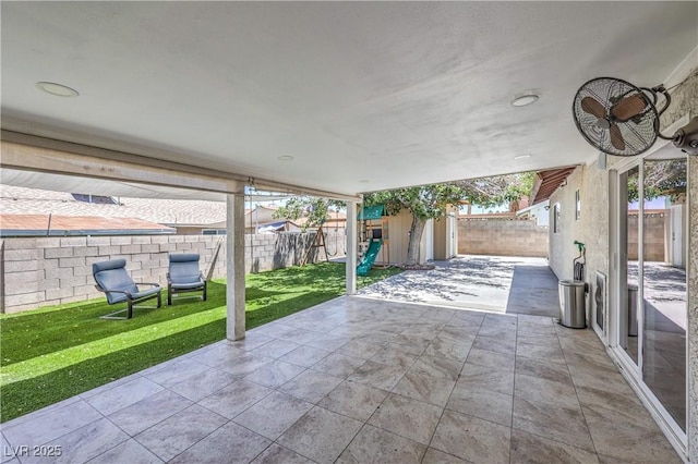 905 Smith St, Las Vegas, NV 89108 - fenced backyard featuring a storage shed and a patio