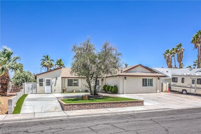 905 Smith St, Las Vegas, NV 89108 - view of front of house featuring stucco siding and concrete driveway