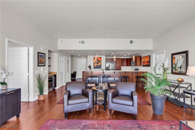 150 Las Vegas Blvd Unit 1906, Las Vegas, NV 89101 - living area with wood finished floors and beverage cooler
