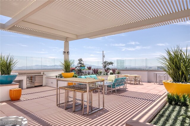 150 Las Vegas Blvd Unit 1906, Las Vegas, NV 89101 - view of patio / terrace featuring outdoor dining space, a pergola, and area for grilling