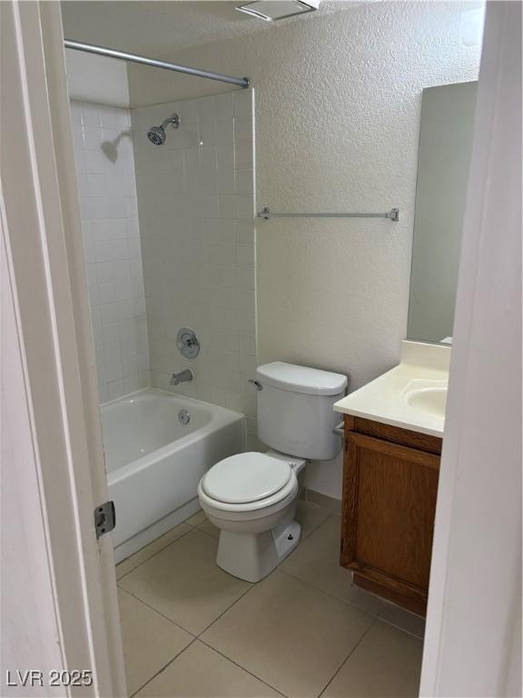 925 Falconhead Ln Unit 102, Las Vegas, NV 89128 - bathroom featuring vanity,  shower combination, and tile patterned floors