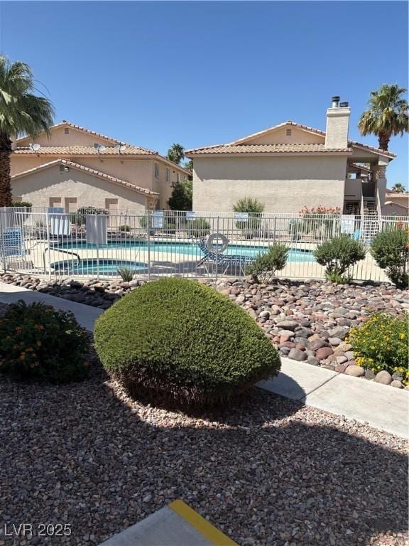 925 Falconhead Ln Unit 102, Las Vegas, NV 89128 - view of home's community featuring a pool