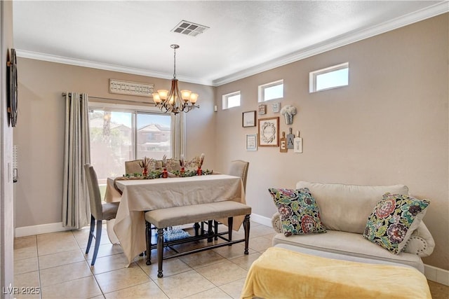 5516 Tantalum Ln, Las Vegas, NV 89122 - dining space featuring a chandelier, ornamental molding, and light tile patterned floors