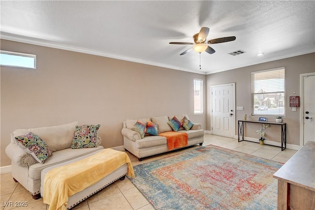5516 Tantalum Ln, Las Vegas, NV 89122 - living room featuring light tile patterned floors, healthy amount of natural light, crown molding, and ceiling fan
