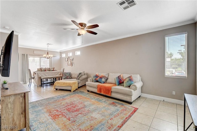 5516 Tantalum Ln, Las Vegas, NV 89122 - living area featuring light tile patterned flooring, a chandelier, ceiling fan, and ornamental molding