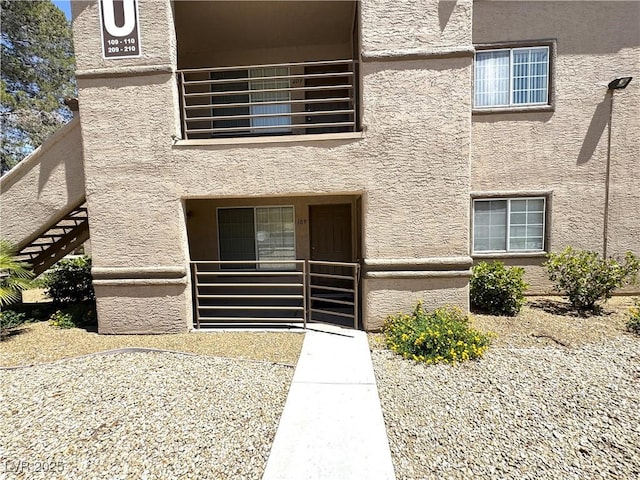 9070 Spring Mountain Rd Unit 109, Las Vegas, NV 89117 - property entrance featuring stucco siding