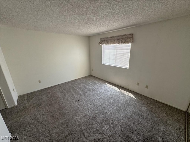 9070 Spring Mountain Rd Unit 109, Las Vegas, NV 89117 - carpeted empty room with a textured ceiling