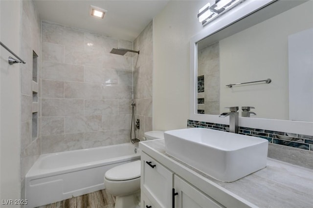 3708 Lorraine Ln, Las Vegas, NV 89120 - full bath featuring vanity,  shower combination, backsplash, and wood finished floors