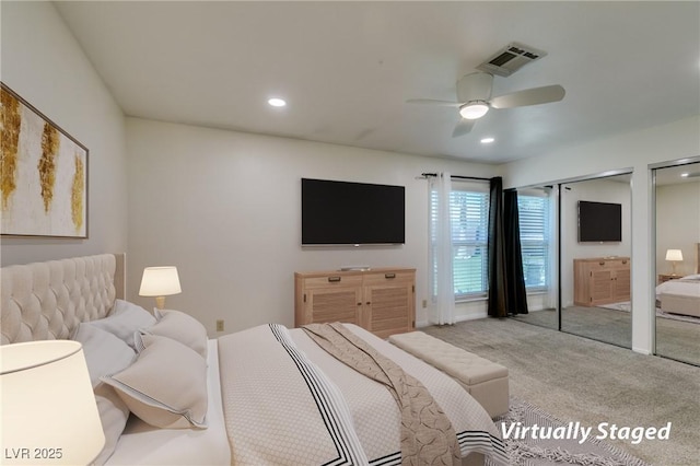3708 Lorraine Ln, Las Vegas, NV 89120 - carpeted bedroom with two closets, recessed lighting, and a ceiling fan