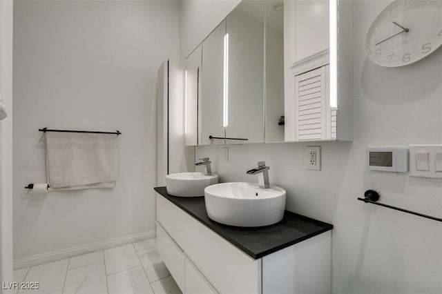 3708 Lorraine Ln, Las Vegas, NV 89120 - full bath with double vanity and marble finish flooring