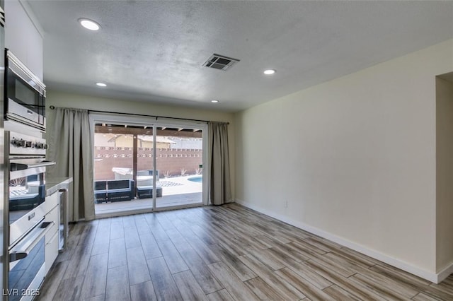 3708 Lorraine Ln, Las Vegas, NV 89120 - unfurnished room with wood finished floors and recessed lighting