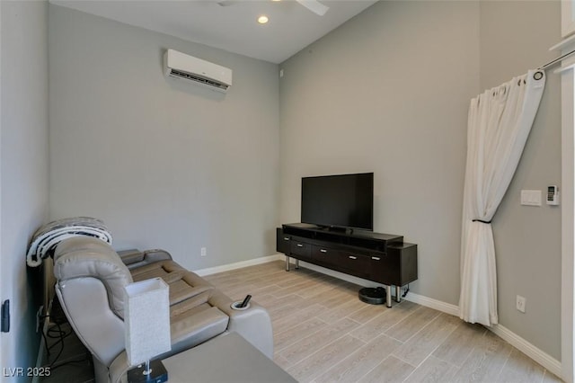 3708 Lorraine Ln, Las Vegas, NV 89120 - living area with a wall unit AC, ceiling fan, light wood finished floors, and recessed lighting
