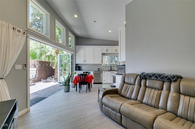3708 Lorraine Ln, Las Vegas, NV 89120 - living area featuring high vaulted ceiling, light wood-style flooring, and recessed lighting