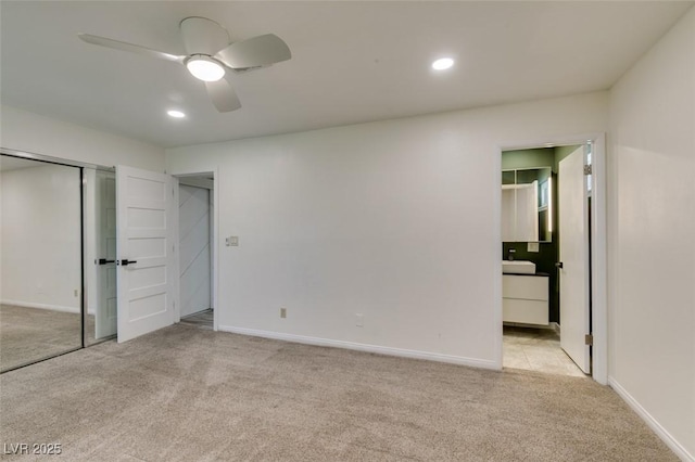 3708 Lorraine Ln, Las Vegas, NV 89120 - unfurnished bedroom featuring light carpet, recessed lighting, connected bathroom, a closet, and a ceiling fan