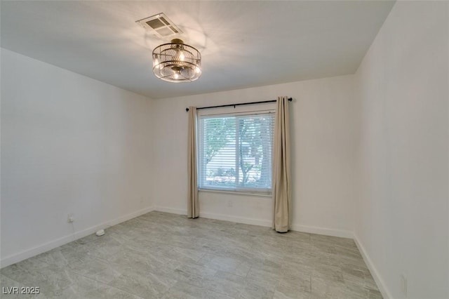 3708 Lorraine Ln, Las Vegas, NV 89120 - unfurnished room featuring a chandelier and baseboards