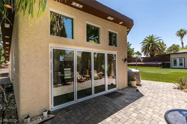 3708 Lorraine Ln, Las Vegas, NV 89120 - view of home's exterior featuring stucco siding and a patio