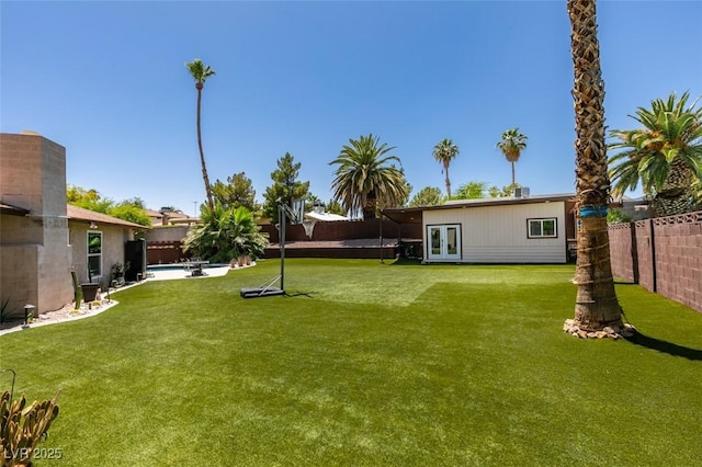 3708 Lorraine Ln, Las Vegas, NV 89120 - fenced backyard with french doors