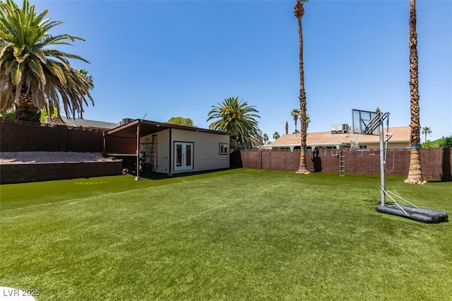 3708 Lorraine Ln, Las Vegas, NV 89120 - fenced backyard with french doors