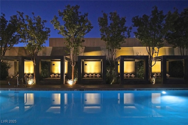 4471 Dean Martin Dr Unit 2406, Las Vegas, NV 89103 - pool at twilight featuring an outdoor pool