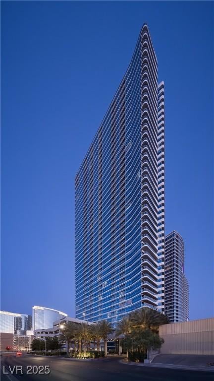 4471 Dean Martin Dr Unit 2406, Las Vegas, NV 89103 - view of property at twilight