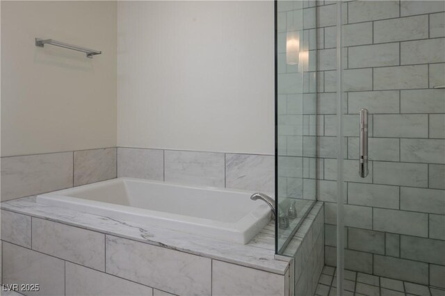 4471 Dean Martin Dr Unit 2406, Las Vegas, NV 89103 - full bathroom featuring a stall shower and a bath
