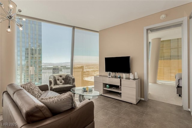 3722 Las Vegas Blvd Unit 3209, Las Vegas, NV 89158 - living room featuring a chandelier, tile patterned floors, and a wall of windows