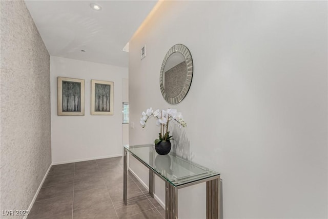 3722 Las Vegas Blvd Unit 3209, Las Vegas, NV 89158 - corridor featuring baseboards and tile patterned floors