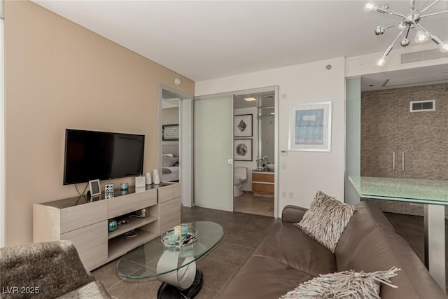 3722 Las Vegas Blvd Unit 3209, Las Vegas, NV 89158 - living room with a chandelier and tile patterned flooring