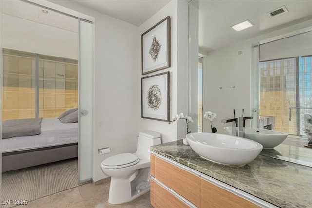 3722 Las Vegas Blvd Unit 3209, Las Vegas, NV 89158 - ensuite bathroom with vanity and tile patterned floors