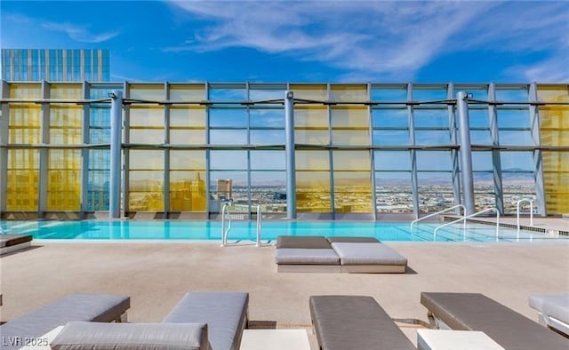 3722 Las Vegas Blvd Unit 3209, Las Vegas, NV 89158 - community pool featuring a patio