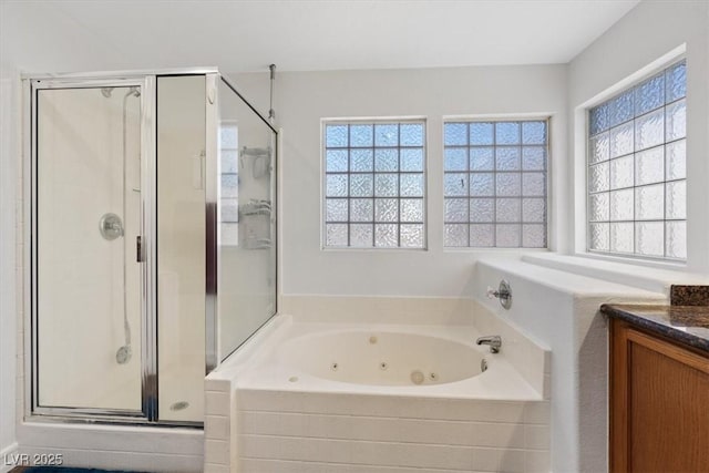 741 Wildwood Beach Ave, Henderson, NV 89052 - bathroom with a stall shower, a whirlpool tub, and vanity
