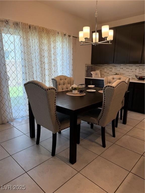 1618 Dakota Group Ave, North Las Vegas, NV 89084 - dining space featuring a chandelier and light tile patterned floors