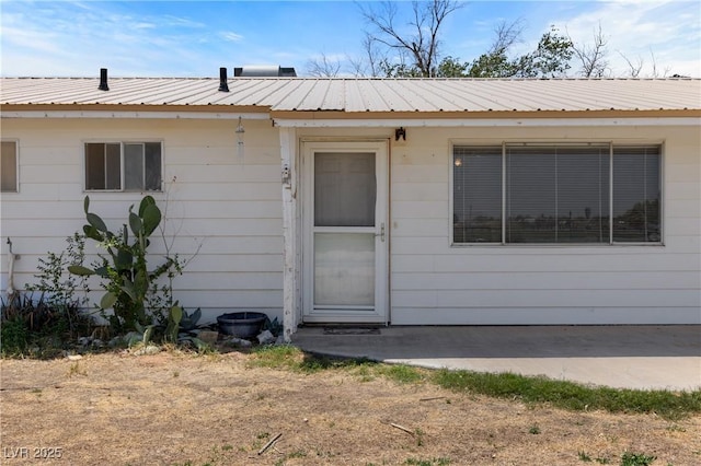 585 W Ingram Ave, Overton, NV 89040 - entrance to property featuring a metal roof and a patio area