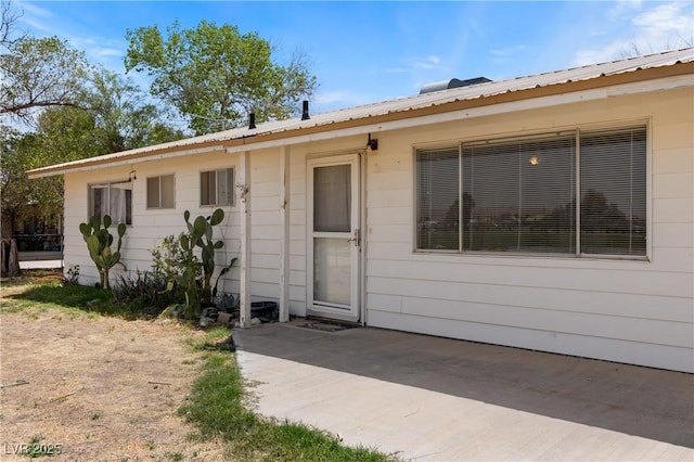 585 W Ingram Ave, Overton, NV 89040 - entrance to property with a metal roof and a patio