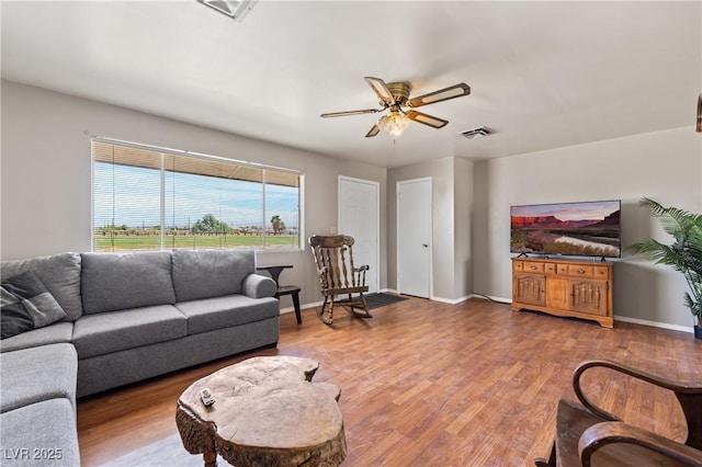 585 W Ingram Ave, Overton, NV 89040 - living room with a ceiling fan and wood finished floors